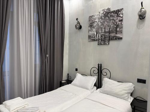 Postel nebo postele na pokoji v ubytování Hotel Four Inn