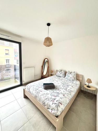 Postel nebo postele na pokoji v ubytování T2 cosy - Idéal curistes et escapade bien-être