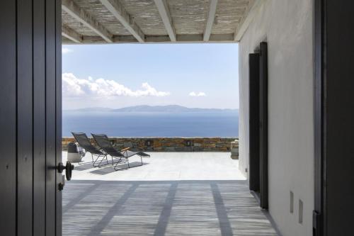 a view of the ocean from a house balcony at House G in Kardiani Tinos in Kardiani