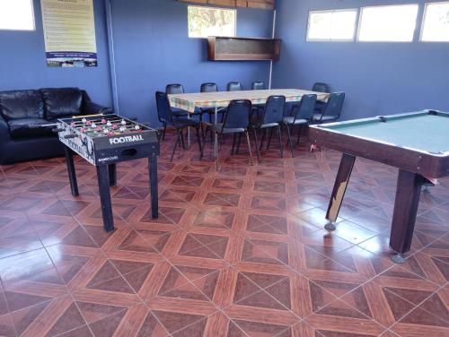 a room with a ping pong table and a ping pong table at Casona familiar ,Rosario valle del elqui in La Serena
