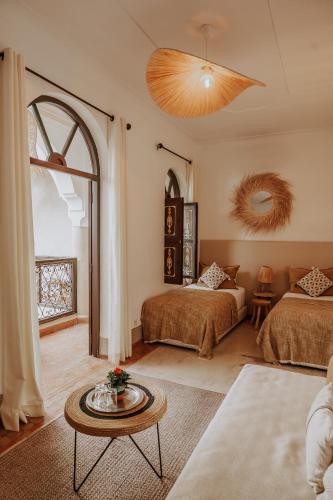 Katil atau katil-katil dalam bilik di Riad Bamaga