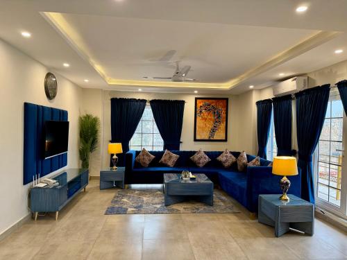 Ruang duduk di Tom's Luxury Hotel