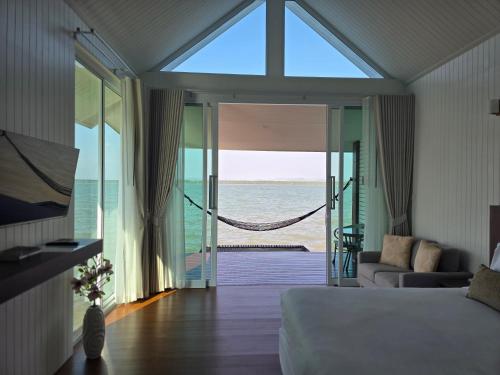 Postel nebo postele na pokoji v ubytování Satun Sea Balcony ระเบียงเล