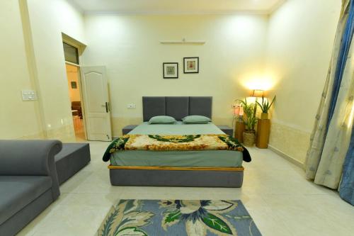 Ένα ή περισσότερα κρεβάτια σε δωμάτιο στο Ardaas Homestay