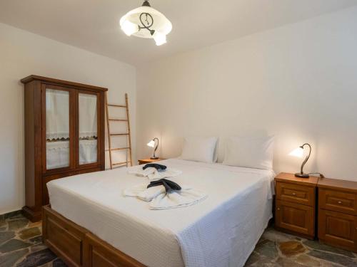 Postel nebo postele na pokoji v ubytování Paros' slice of Paradise