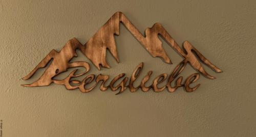 a sign that saysma excellence hanging on a wall at Ferienhaus Auszeit in Grabenstätt