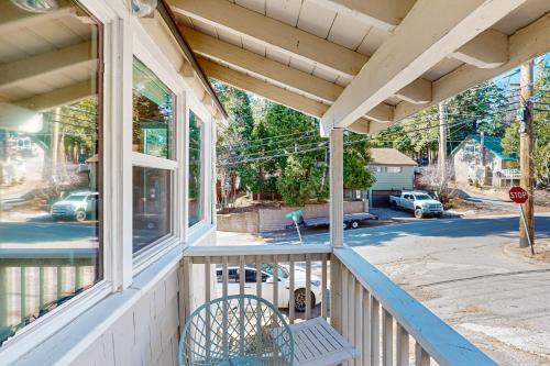 a porch of a house with a stop sign at The Cozy Timber in Lake Arrowhead