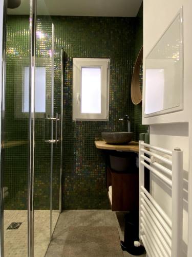 Koupelna v ubytování ID'home le Royale