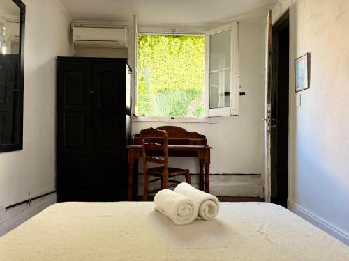Ένα ή περισσότερα κρεβάτια σε δωμάτιο στο Casamor