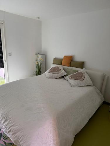 Ένα ή περισσότερα κρεβάτια σε δωμάτιο στο Summer House