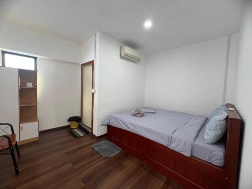 Postel nebo postele na pokoji v ubytování White Rose Guesthouse