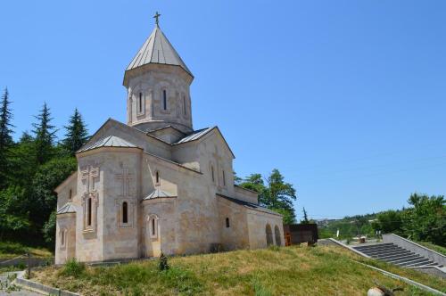 an old church on top of a hill at The Rolé House in Gurjaani