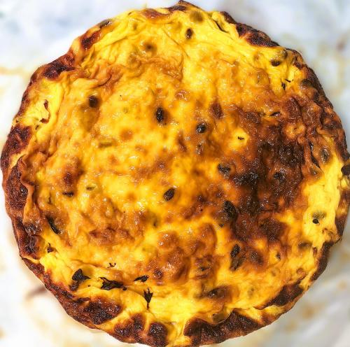 a close up of a cheese pizza at Voinescu House - Natural Living & Eating in Şimon