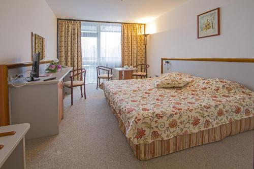 Postel nebo postele na pokoji v ubytování Hotel Samokov