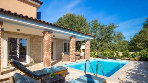 Πισίνα στο ή κοντά στο Family Villa Di