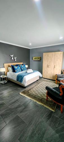 Postel nebo postele na pokoji v ubytování Hartklop Luxury Self Catering Guesthouse
