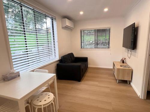 TV a/nebo společenská místnost v ubytování Park View Guest suite A