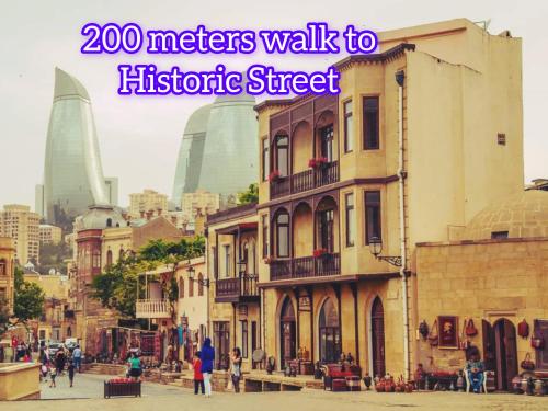 a sign that reads meters walk to historic street at King Hostel in Old City in Baku