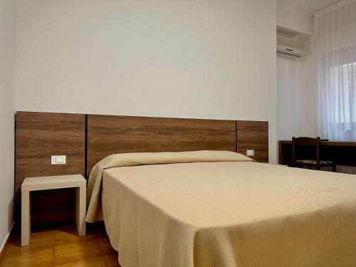 Una cama o camas en una habitación de Hotel Soleado