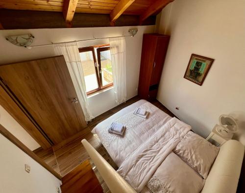 Ένα ή περισσότερα κρεβάτια σε δωμάτιο στο Kristal House