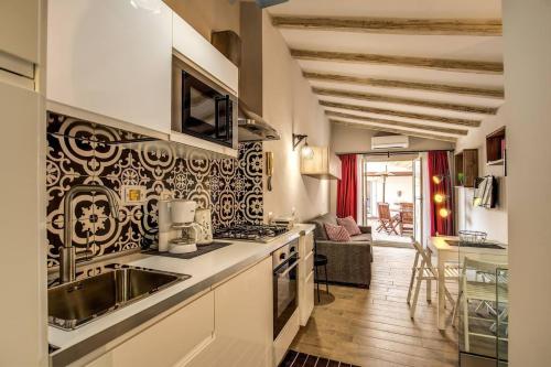Attic with Terrace by Trevi Fountain