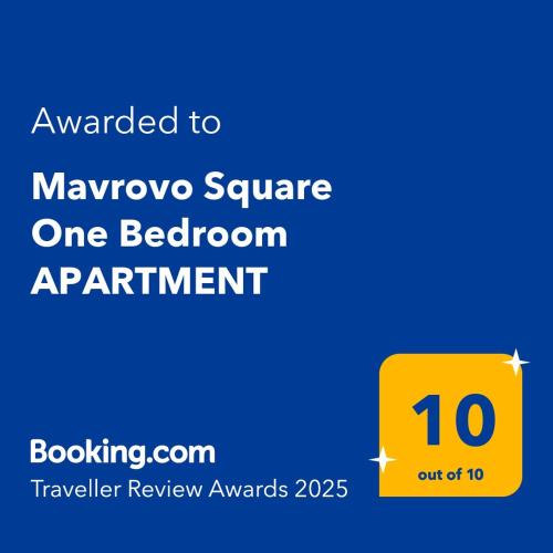 a yellow sign with the words moveyon square one bedroom apartment at Mavrovo Square One Bedroom APARTMENT in Mavrovo