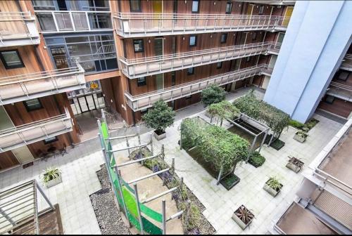 an overhead view of a courtyard in a building at Spacious Central Penthouse Apartment With Parking in Manchester