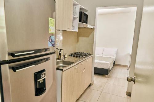 Kuchyň nebo kuchyňský kout v ubytování Apartamentos y Loft en Zona Rosa de Laureles
