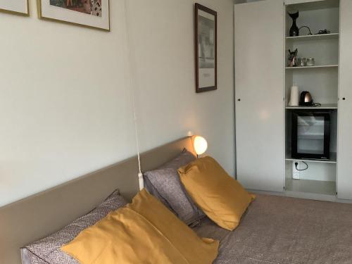 Postel nebo postele na pokoji v ubytování Noir de Noir Bruges