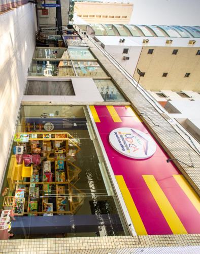 a view of a store from the top of a building at Flat Bervely Hills 308 in Vila Velha