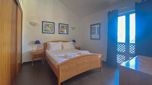 Postel nebo postele na pokoji v ubytování Penthouse Duplex Marina Plaza T1 HsR Marina Vilamoura