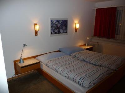 
Ein Bett oder Betten in einem Zimmer der Unterkunft Hotel Panorama Windegg
