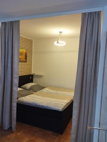 Katil atau katil-katil dalam bilik di Ferienwohnung Leinetal