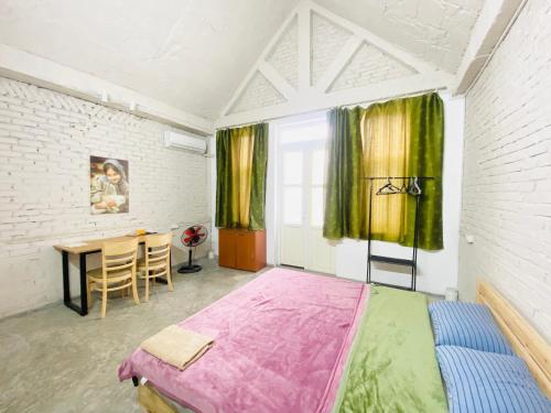 Postel nebo postele na pokoji v ubytování May's house (Nhà của Mây)