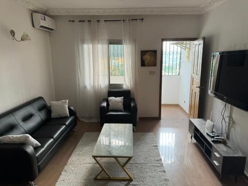 TV/Unterhaltungsangebot in der Unterkunft Appartements modernes, Wifi, TV - Yaoundé, Omnisports