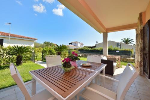 Κήπος έξω από το Residence Le Canne
