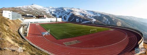 an aerial view of a soccer field on a mountain at SnowGranada Hight Level Galatino in Sierra Nevada