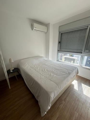 Postel nebo postele na pokoji v ubytování Hermoso monoambiente en Punta Carretas piso 11