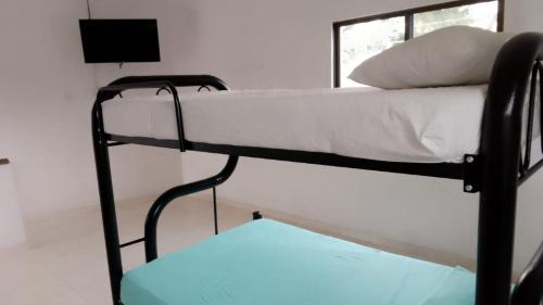 Кровать или кровати в номере Casa Vacacional para Hasta 28 Personas