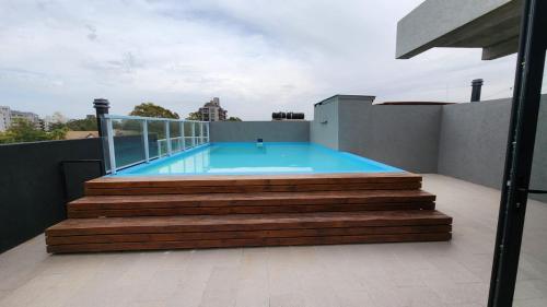 Bazén v ubytování Centro Pinamar 2 Ambientes A Estrenar nebo v jeho okolí