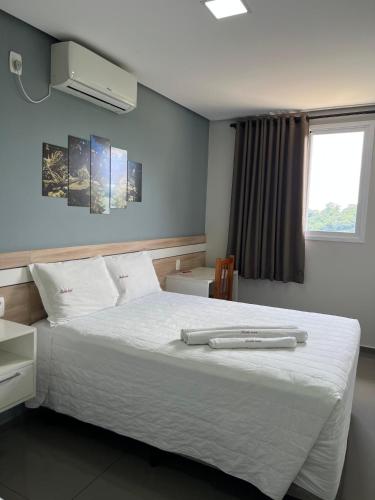 Postel nebo postele na pokoji v ubytování RUBBO HOTEL