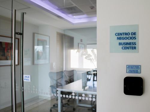 a room with a sign that reads certified necologists business center at Holiday Inn Express Puerto Vallarta by IHG in Puerto Vallarta