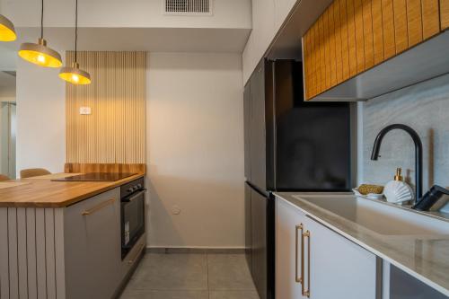 Cucina o angolo cottura di Boutique Apartments - By Harim