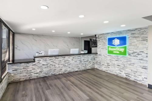 a lobby of a sunoco gas station at SureStay Hotel by Best Western Phoenix Airport in Phoenix