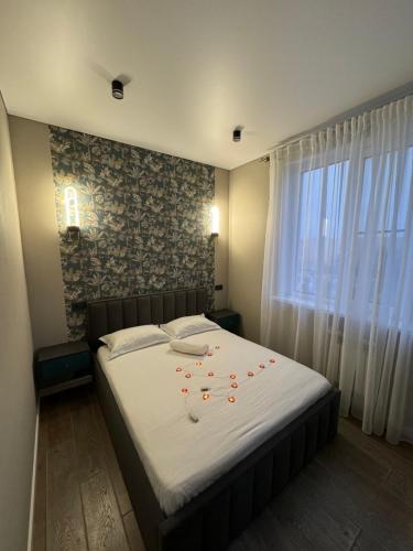 Voodi või voodid majutusasutuse Gold Apple apartment- уют до мелочей toas