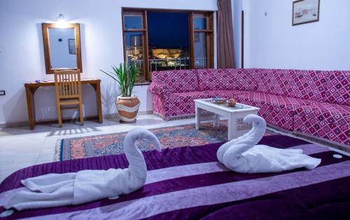 Posezení v ubytování Thebes Hotel