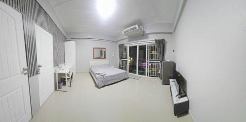 Postel nebo postele na pokoji v ubytování Future Hostel Pattaya