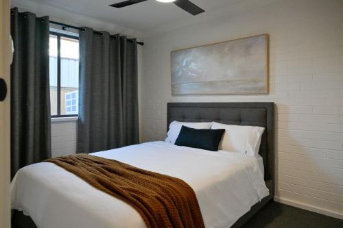 Ένα ή περισσότερα κρεβάτια σε δωμάτιο στο Affordable Quality - Central Wagga