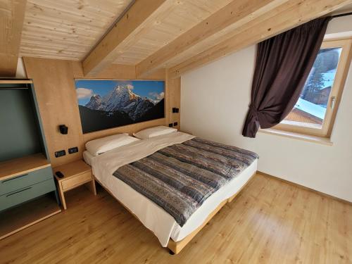 Postel nebo postele na pokoji v ubytování Garni B&B Mozart Nesthouse
