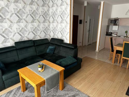 Posedenie v ubytovaní Apartamenty Plaza Słupca